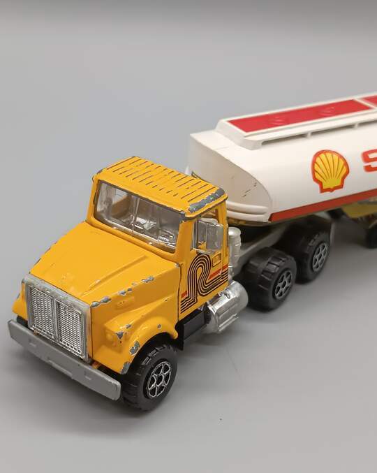 HO Camion Mercedes capot rond avec semi-remorque à benne basculante