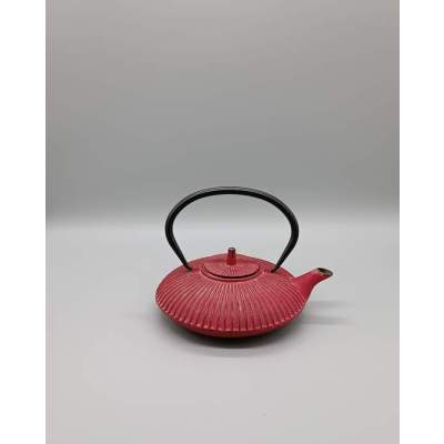 Théière en fonte rouge vieillie