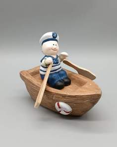 Décoration Marin Assis et sa Barque