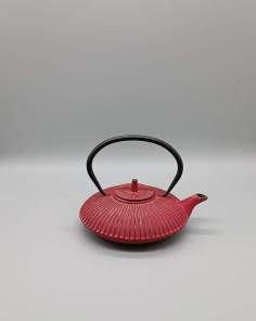 Théière en fonte rouge vieillie